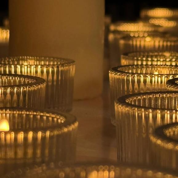 Photo by Stoppelenburg Uitvaart on November 27, 2025. May be an image of candle holder, candle and text.